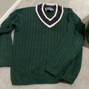 Dark green with burgundy and beige neckline this is a heavy sweater